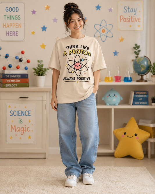 Think Like a Proton T‑Shirt — Always Positive Cute Science Tee